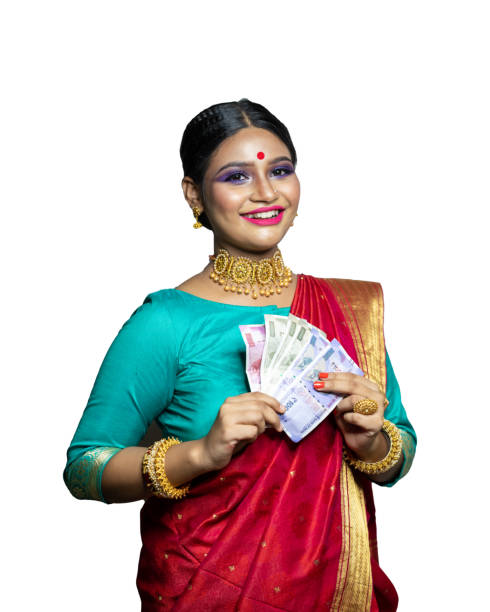 istock Beautiful Young woman holding Indian rupee notes 1284491758