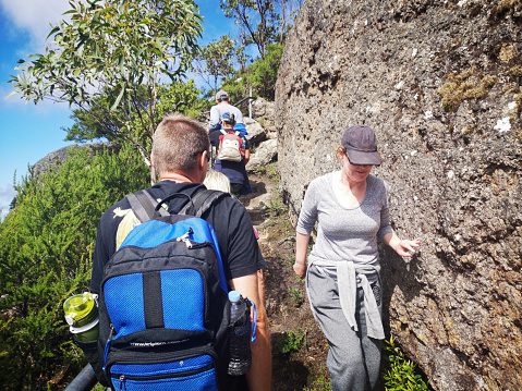 Wilsons Promontory National Park, Gippsland, Australia: March 08, 2020: Tourists climb to the summit of Mount Oberon at Wilsons Promontory National Park.
