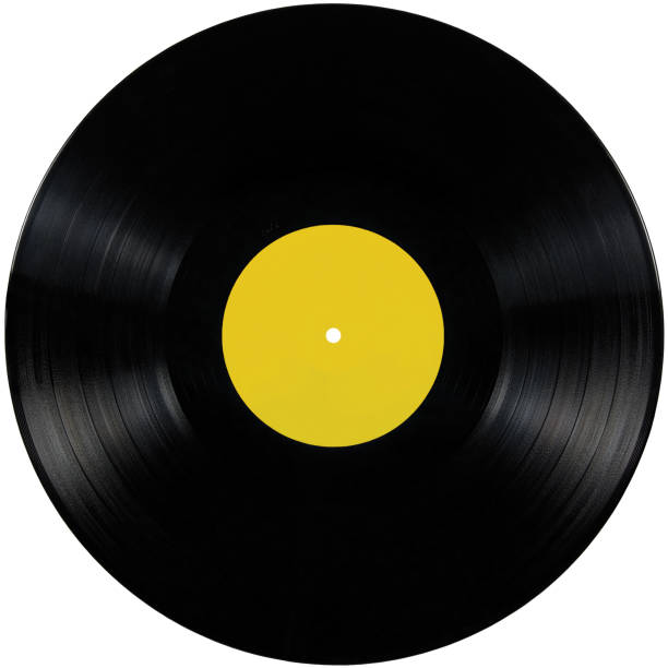 istock Black vinyl record LP album disc, isolated blank empty yellow label tag copy space background, long play disk flat lay macro closeup 1284506438