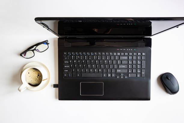 istock black laptop and girls hands 1284514336