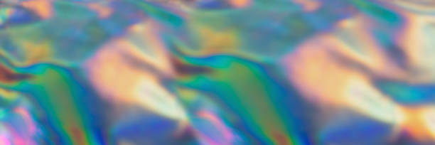 istock Blurred holographic abstract multicolored neon background, banner 1284514837