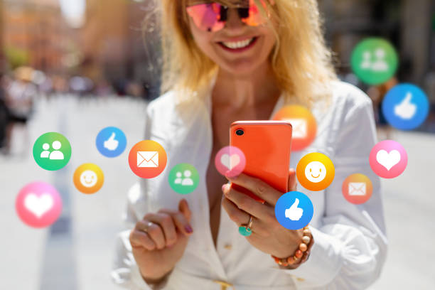 istock Woman using different services and apps on her phone 1284519669