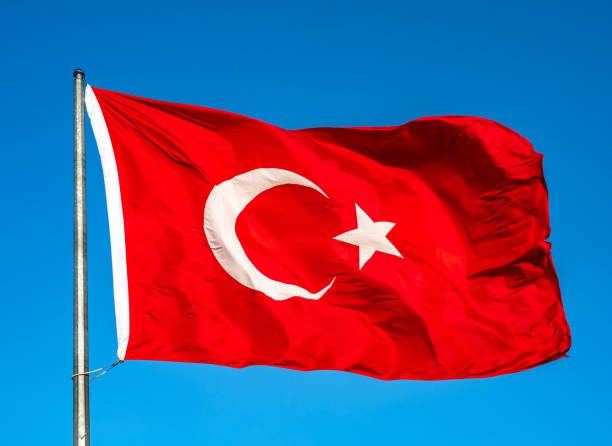 istock Turkish flag waving in the sky, Turkey. 1284523191