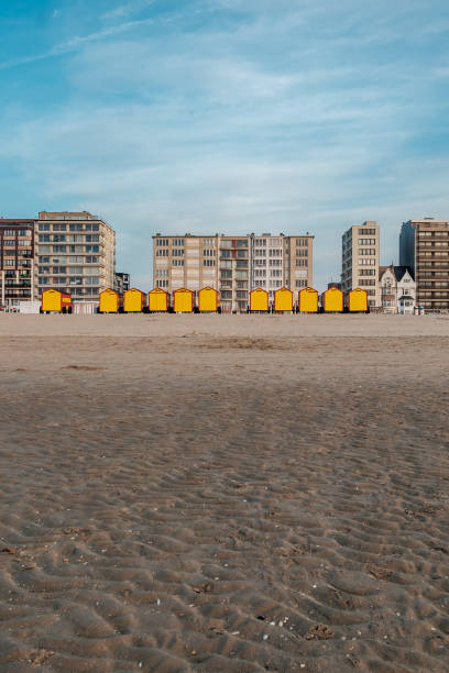 istock Vintage beach huts on the Belgian coast at sunset 1284524789
