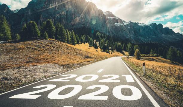 istock 2021 New Year road trip travel and future vision concept . 1284525664