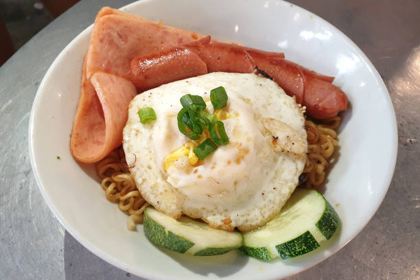 istock Fried noodle with sausage, ham and egg. 1284526915
