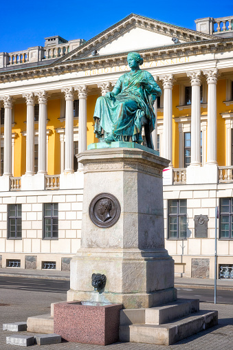 Statue of Hygieia, made by Albert Wolff in 1844, Poznan, Poland. The Raczynski library building at the background