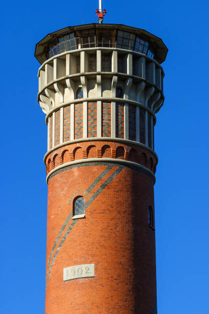istock Close-up on a lookout tower of brick stone 1284531547