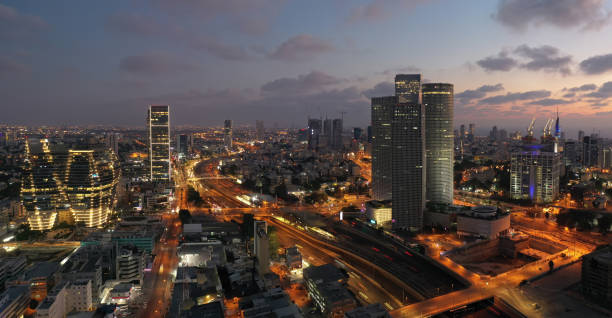 istock Modern office building downtown cityscape skyscraper skyline aerial view night 1284534162
