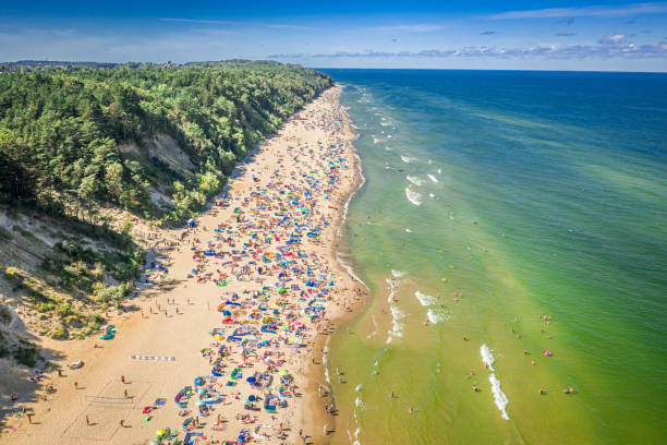 istock Crowded beach on Baltic Sea in summer, aerial view 1284535160