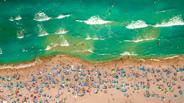 istock Top down view of crowded beach, Baltic Sea, aerial view 1284535473