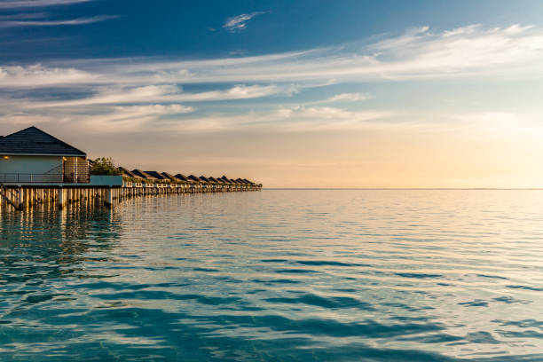 istock Beautiful summer beach paradise with sandy beach and villas 1284537586