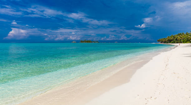 istock White sandy beach in Maldives with amazing blue lagoon 1284537853