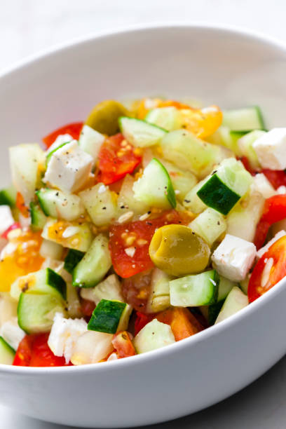 istock vegetable salad with feta cheese 1284538710
