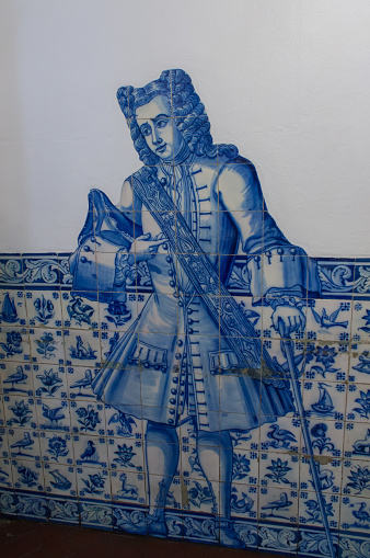 An explorer depicted in portugese tiles in Lisbon Portugal
