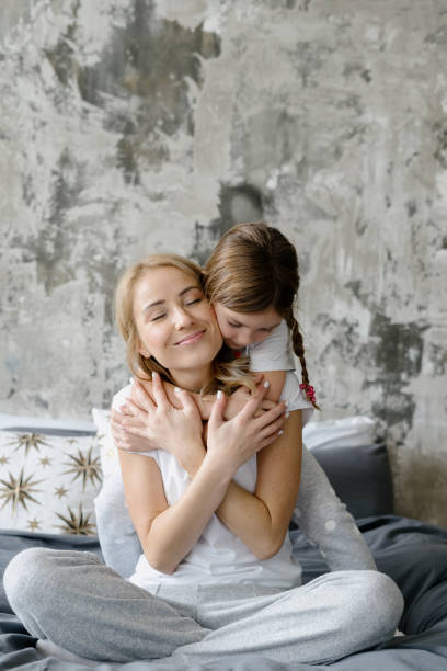 istock Mother and daughter spending time at home 1284540750