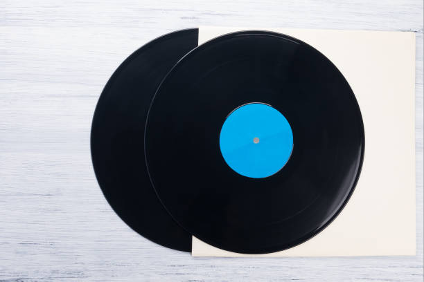 istock two old vinyl records lie on paper packaging, top view 1284541518