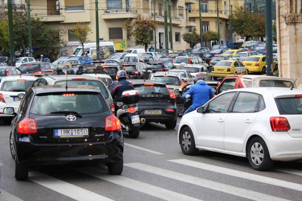 Heavy traffic on the streets of Athens Heavy traffic on the streets of Athens after the announcement for a second lockdown in Greece from 7th to 30th of November 2020, due to Covid-19 outbreak - Athens, Greece, November 6 2020. traffic in athens greece stock pictures, royalty-free photos & images