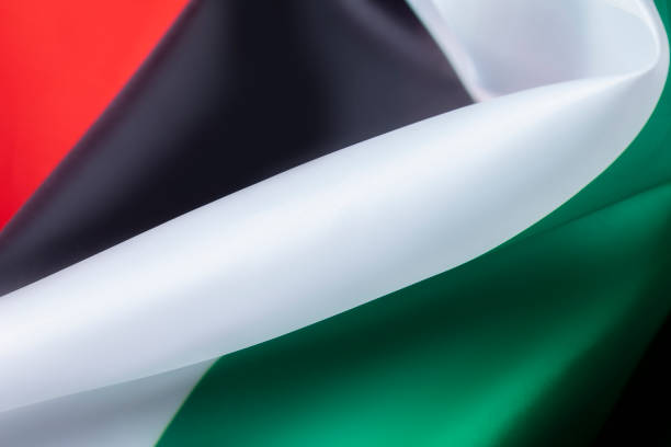 gefaltete flagge der vereinigten arabischen emirate - nationalfeiertag stock-fotos und bilder