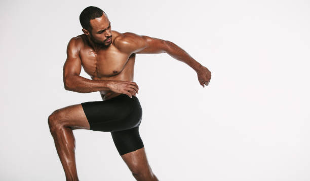 istock Muscular athlete doing fitness training 1284544829