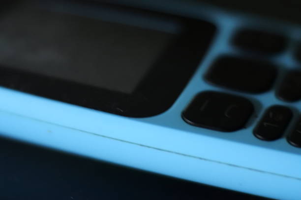 istock Selective focus shot of a bright flashlight on a mobile phone 1284544866