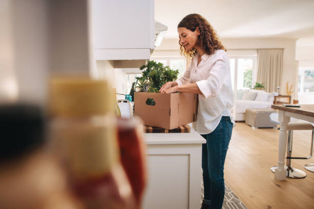 istock Woman checking her fresh vegetable delivery 1284550730