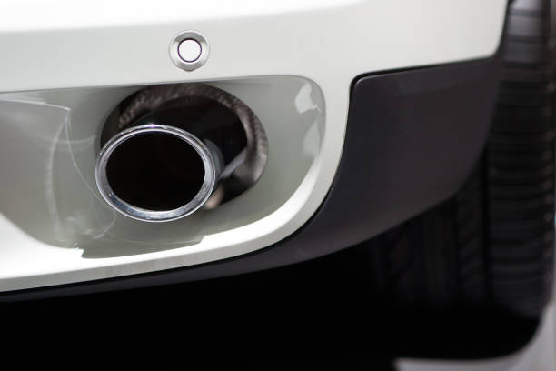 istock Exhaust pipe in bumper of modern car 1284552190