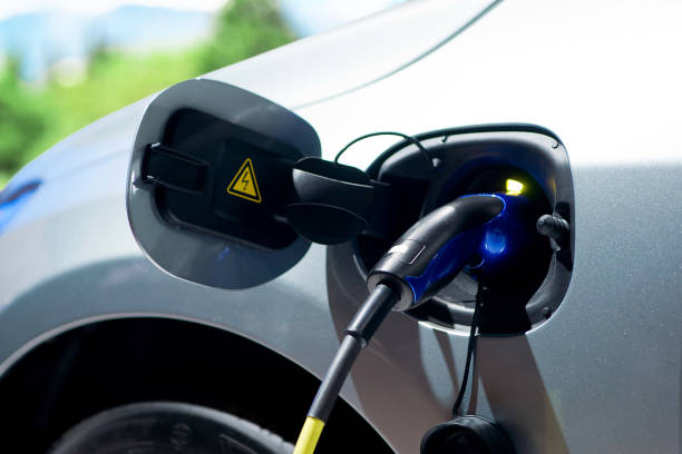 istock Electric car charging at station 1284552735