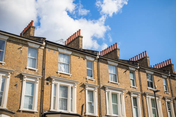 Traditional English terraced houses in Crouch End, London Row of traditional English terraced houses in Crouch End, north London window chimney london england residential district stock pictures, royalty-free photos & images