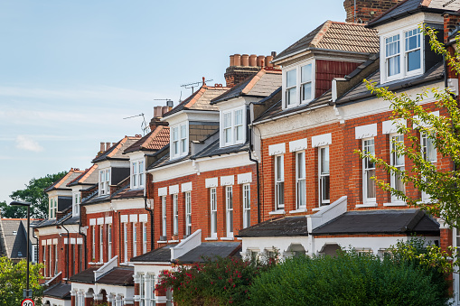 Row of English terraced houses featuring dormer windows in loft conversion in Crouch End, London