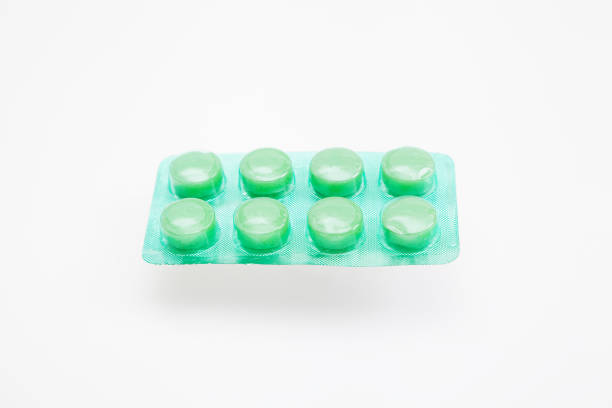 istock Top of blister with green tablets 1284558871