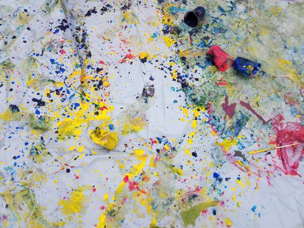 istock colorful mess of paint with plastic cups 1284559336