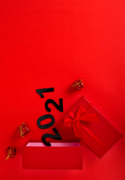 istock New year gift box. Christmas and New Year background flat 1284561356