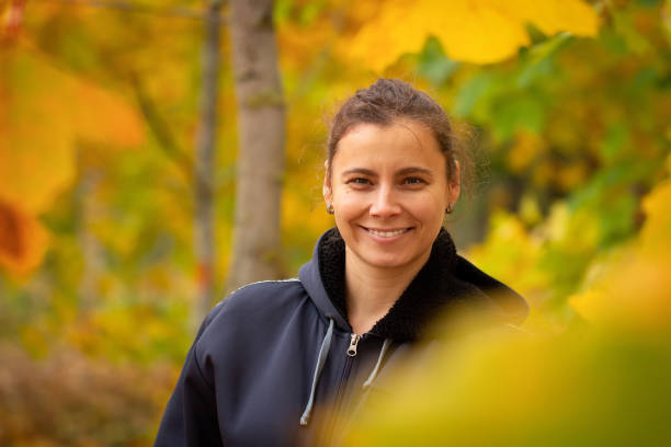 istock Portrait smiling young woman. 1284561433