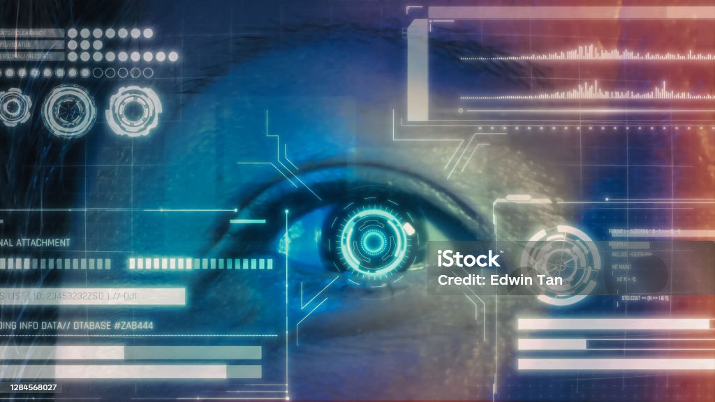 Security Retina Scanner on asian chinese brown eye Surveillance Stock Photo
