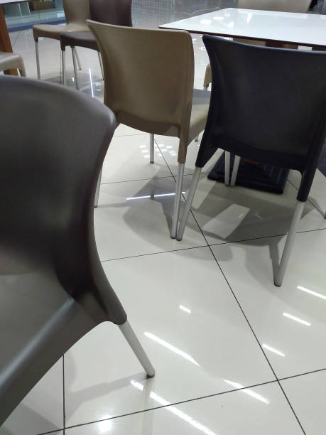 istock Chairs and tables in a cafe. 1284570239