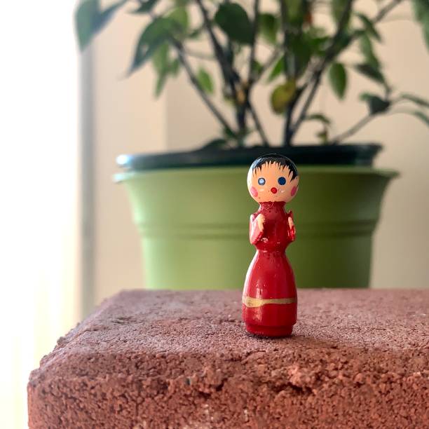 istock Vintage Miniature Girl Doll 1284573247