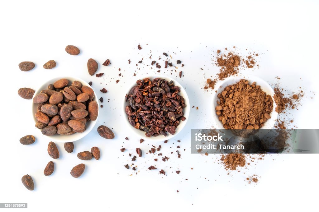 Cacao beans seeds, Cacao nibs and cacao powder isolated on white background. Cocoa Bean Stock Photo