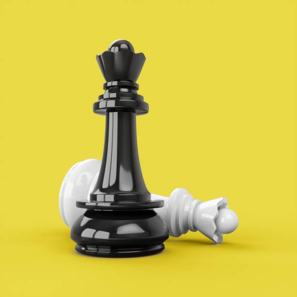 istock 3D Rendering White and Black Queen chess pieces isolated on yellow background 1284579378