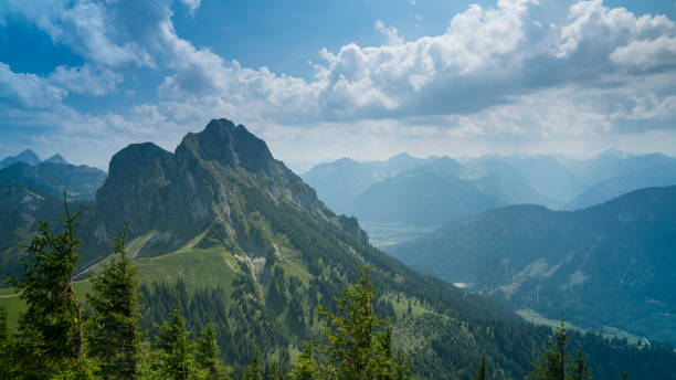 istock Germany, Allgaeu, Aggenstein, Impressive high mountain view from above, countless green trees covering nature scenery 1284580613