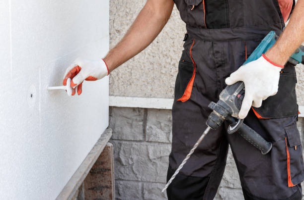 istock Insulation of the house with polyfoam. 1284581225
