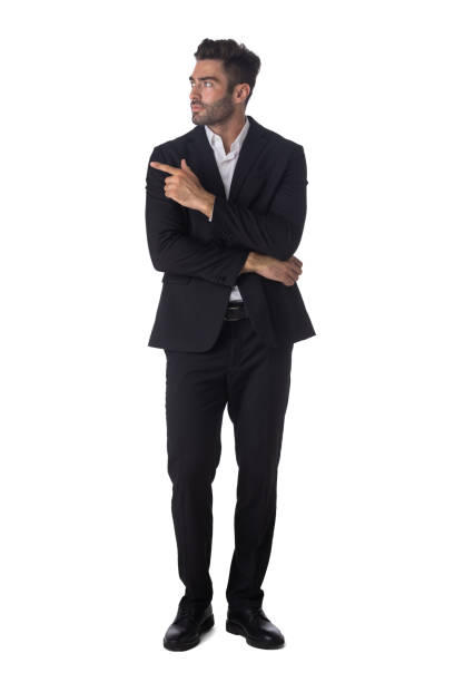 istock Portrait of business man pointing 1284582296