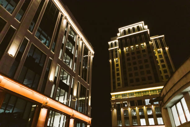 istock high-tech building architecture geometry staircase city symmetry glow 1284582902