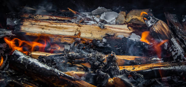 istock Firewood and coals burn in flames 1284584254