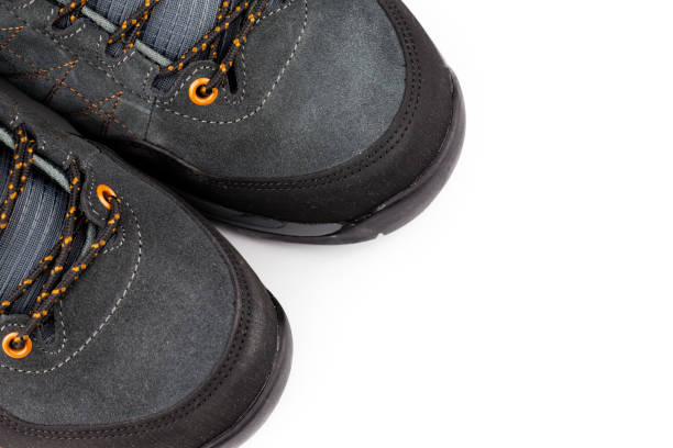 istock Hiking shoes isolated on white background. 1284584879