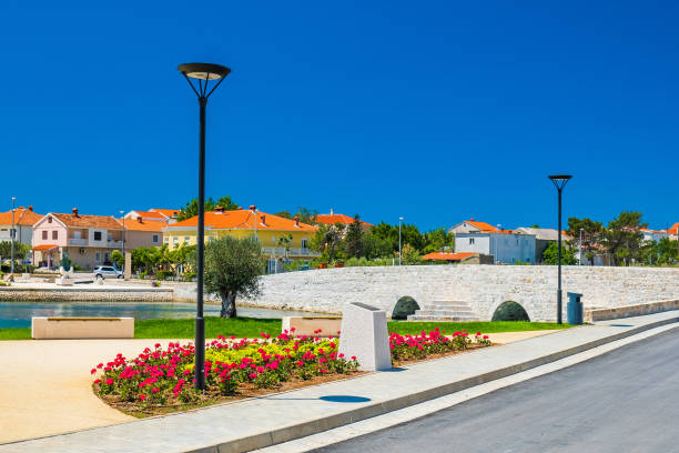 istock Croatia, town of Nin, old stone bridge 1284586092