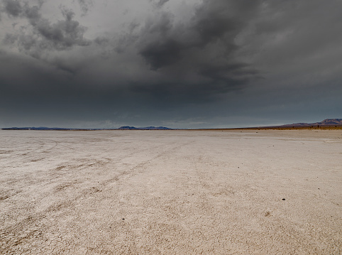 El Mirage Mojave desert dry lake bed in Southern California with stormy sky.