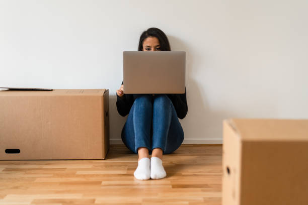 istock Using a laptop in the new apartment 1284588084