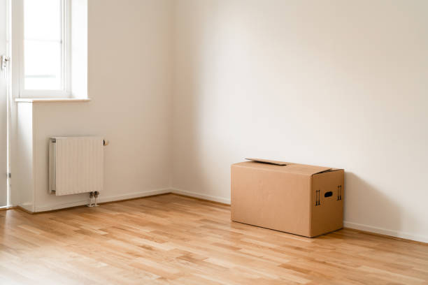 istock Cardboard boxes in the new apartment 1284588101