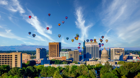 Boise city skyline with hot air balloons and blue sky